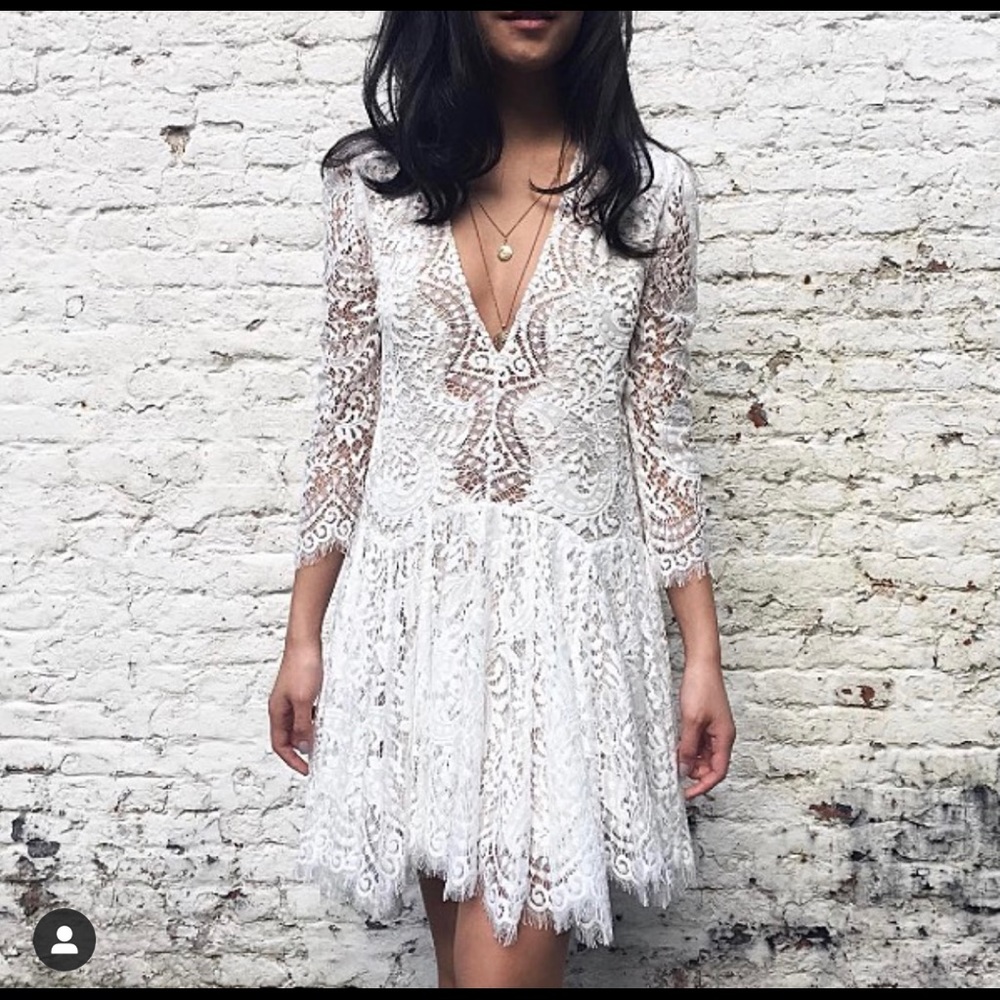 White lace flirty V neck dress